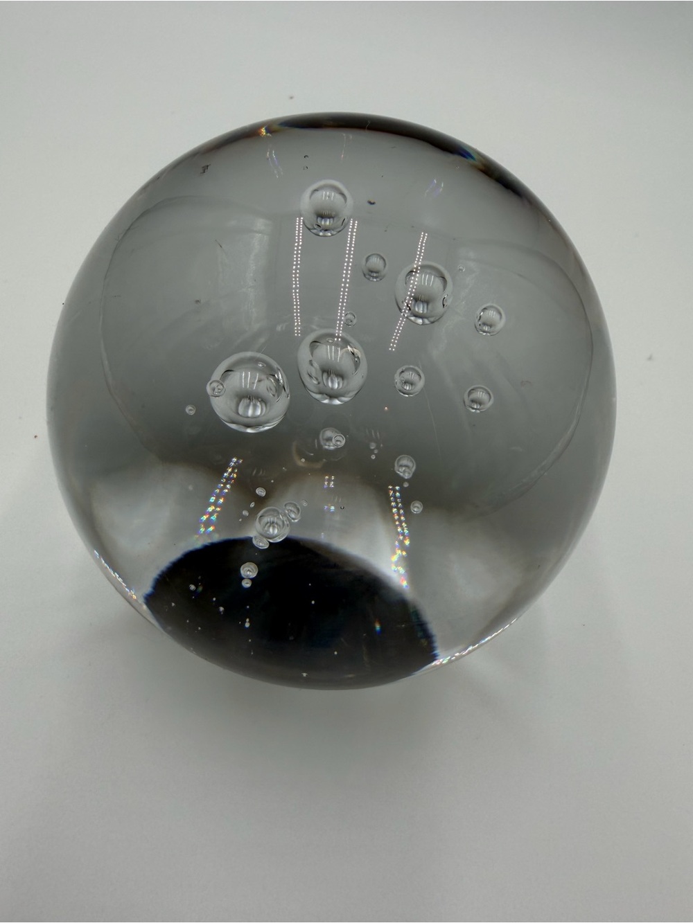 Vintage clear crystal art glass paperweight with a controlled bubble design.